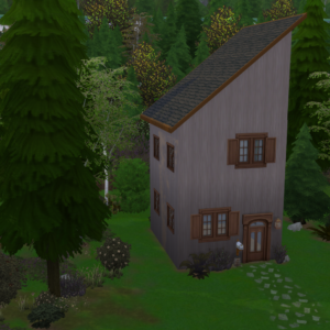 A tall, narrow wooden home, designed from "The Ulver: 10x20 Tiny House Kit," features brown shutters and is nestled among lush green trees and bushes. Its sloped roof adds a distinctive architectural element. A small stone path guides visitors to the front door, creating a peaceful and secluded setting.